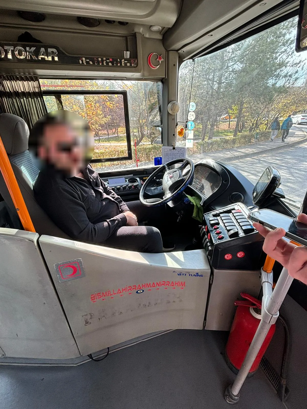Interviewing a bus driver in the cabin